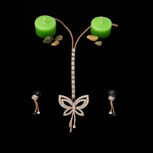 Rose Gold Butterfly Motif Pendant & Tassel Earring Set