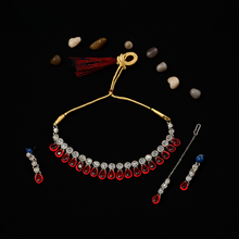 Gold Tone Red Stone Kundan Necklace Set with Matching Earrings & Maang Tikka