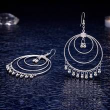 Layered Hoop Bell Charm Earrings – Gold & Silver Finish (Variant)